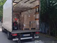 Транспортни услуги с бус с падащ борд.