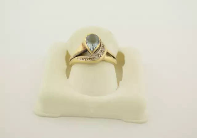 златен пръстен с бледосин камък 33483 - 2
