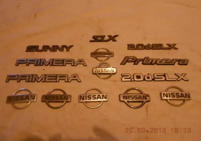 19. Снимка на емблеми и надписи за коли