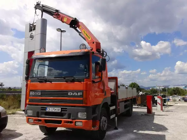 Транспортни услуги с камион с кран Полезен товар на камиона