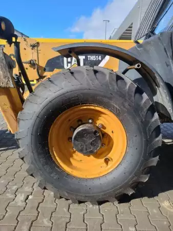 9. Снимка на Телескопичен товарач Caterpillar TH514