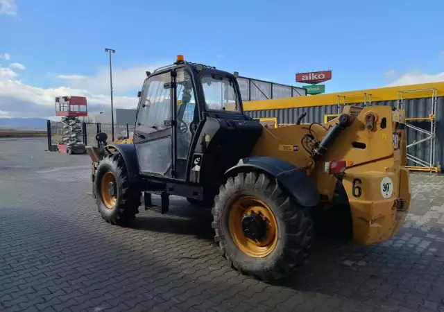 3. Снимка на Телескопичен товарач Caterpillar TH514