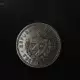 . Снимка на Изключително рядка монета на Чегевара