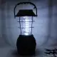 . Снимка на Нова соларна лампа с динамо и зареждане от батерии контакт..