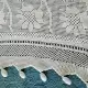 . Снимка на плетена покривка на една кука