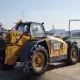 . Снимка на Телескопичен товарач Caterpillar TH407AG