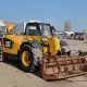 . Снимка на Телескопичен товарач Caterpillar TH407AG