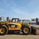 . Снимка на Телескопичен товарач Caterpillar TH407AG