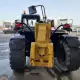 . Снимка на Телескопичен товарач Caterpillar TH407AG