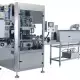 . Снимка на Слийв етикетираща машина Sleeve labeling machine