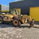 . Снимка на Телескопичен товарач Caterpillar TH514